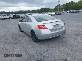 2010 Honda Civic Cpe LX with VIN 2HGFG1B60AH523854, listed as a IAAI auction lot 41953070 with 308,179 mi miles. Bid and sale history available at carsss.com. Image 3.