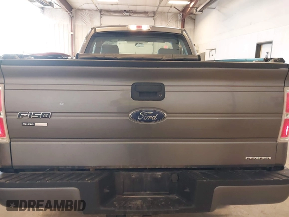 2014 Ford F-150 XL with VIN 1FTMF1CF7EFC67887, listed as a IAAI auction lot 41961500 with 83,934 mi miles and . Bid and sale history available at DreamBid. Image 16.