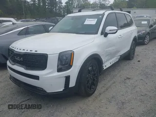 2022 Kia Telluride SX with VIN 5XYP5DHC1NG318216, listed as a IAAI auction lot 41964915 with 22,582 mi miles and . Bid and sale history available at carsss.com. Image 2.