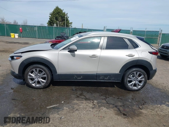 2022 Mazda CX-30 S Select with VIN 3MVDMBBL4NM401563, listed as a IAAI auction lot 41826878 with 4,733 mi miles and . Bid and sale history available at carsss.com. Image 14.