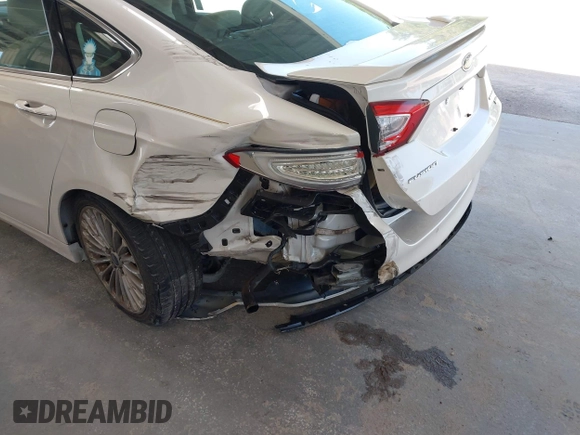 2016 Ford Fusion Titanium with VIN 3FA6P0K96GR390989, listed as a IAAI auction lot 42634275 with 123,559 mi miles and . Bid and sale history available at DreamBid. Image 6.