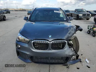 2018 BMW X1 sDrive28i with VIN WBXHU7C3XJ5H38906, listed as a Copart auction lot 36572583 with 71,860 mi miles. Bid and sale history available at carsss.com. Image 5.