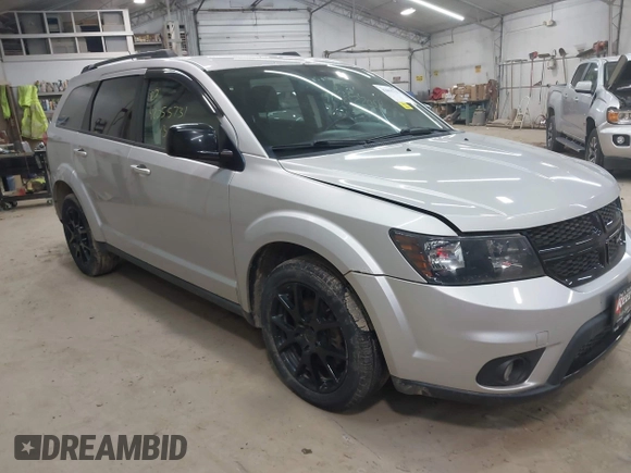 2013 Dodge Journey SXT with VIN 3C4PDCBBXDT661479, listed as a IAAI auction lot 42055731 with 151,963 mi miles. Bid and sale history available at carsss.com. Image 1.