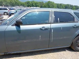 2005 Dodge Magnum z VIN 2D4FV48T35H624544, wystawiony jako IAAI lot #42405272 z przebiegiem 245 529 mil mil oraz . Historia ofert i sprzedaży dostępna na DreamBid. Obrazek 14.