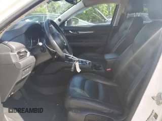 2018 Mazda CX-5 Grand Touring с VIN JM3KFADM3J1351532, выставлен на аукционе Copart как лот 55567405 с пробегом 99 134 миль миль и Списание • Salvage title. История ставок и продаж доступна на DreamBid. Изображение 7.