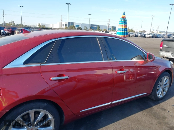 2013 Cadillac XTS Luxury with VIN 2G61P5S3XD9115546, listed as a IAAI auction lot 41980135 with 104,609 mi miles and . Bid and sale history available at DreamBid. Image 13.