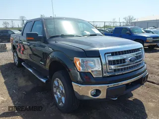 2014 Ford F-150 XL with VIN 1FTFW1ETXEFB51711, listed as a IAAI auction lot 42075381 with 238,603 mi miles. Bid and sale history available at carsss.com. Image 1.