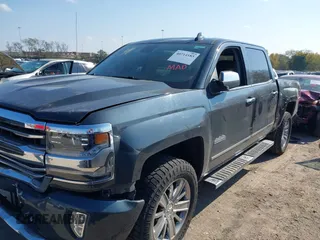 2018 Chevrolet Silverado 1500 High Country with VIN 3GCUKTEC8JG308353, listed as a IAAI auction lot 40714183 with 88,711 mi miles and . Bid and sale history available at DreamBid. Image 2.