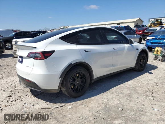 2022 Tesla Model Y Long Range with VIN 7SAYGDEE7NA012634, listed as a Copart auction lot 49206295 with 19,267 mi miles and Clean Title. Bid and sale history available at DreamBid. Image 3.