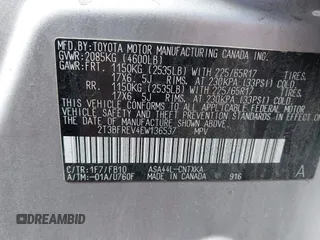 2014 Toyota RAV4 LE with VIN 2T3BFREV4EW136537, listed as a IAAI auction lot 42065728 with 211,039 mi miles and . Bid and sale history available at DreamBid. Image 9.