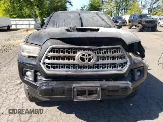 2017 Toyota Tacoma SR5 z VIN 3TMDZ5BN3HM033290, wystawiony jako Copart lot #55990995 z przebiegiem Nie podano mil oraz Szkoda całkowita • Salvage title. Historia ofert i sprzedaży dostępna na DreamBid. Obrazek 5.