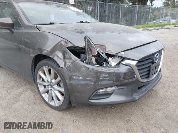 2017 Mazda 3 Touring with VIN 3MZBN1V73HM118104, listed as a IAAI auction lot 42139361 with 71,615 mi miles and . Bid and sale history available at DreamBid. Image 6.