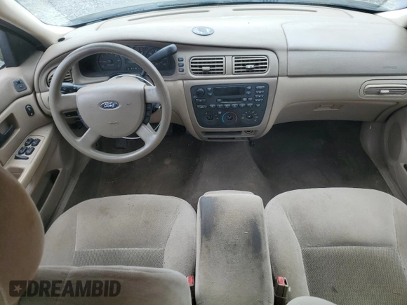 2004 Ford Taurus SE with VIN 1FAFP53274A193186, listed as a Copart auction lot 60255125 with 184,493 mi miles and Salvage title. Bid and sale history available at DreamBid. Image 8.