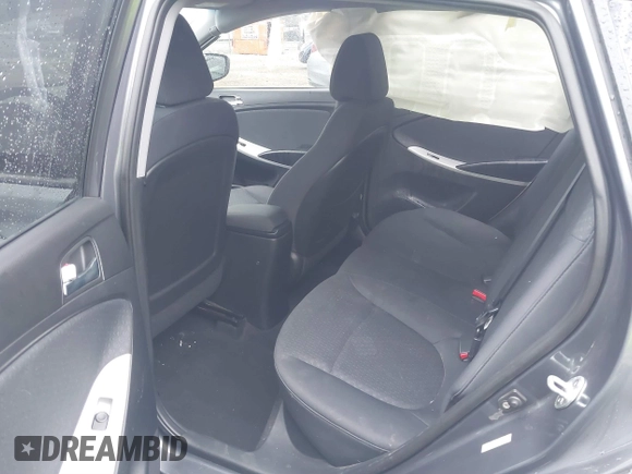 2012 Hyundai Accent SE with VIN KMHCU5AE9CU013458, listed as a IAAI auction lot 41475986 with 88,592 mi miles. Bid and sale history available at carsss.com. Image 8.