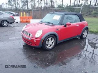 2006 MINI Convertible with VIN WMWRF33526TF64836, listed as a IAAI auction lot 41766880 with 207,094 mi miles and . Bid and sale history available at DreamBid. Image 2.