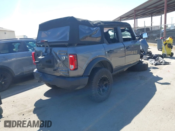 2021 Ford Bronco z VIN 1FMDE5BH9MLB00617, wystawiony jako IAAI lot #42467207 z przebiegiem 36 220 mil mil oraz . Historia ofert i sprzedaży dostępna na DreamBid. Obrazek 4.