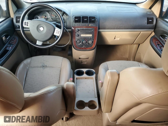 2006 Chevrolet Uplander with VIN 1GNDX33L26D200102, listed as a Copart auction lot 82566104 with 129,553 mi miles and Salvage Title. Bid and sale history available at DreamBid. Image 8.