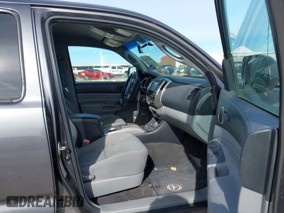 2014 Toyota Tacoma PreRunner with VIN 3TMJU4GN1EM156845, listed as a IAAI auction lot 40972570 with 65,138 mi miles. Bid and sale history available at carsss.com. Image 5.
