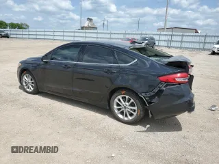 2020 Ford Fusion SE z VIN 3FA6P0LUXLR254247, wystawiony jako Copart lot #60658095 z przebiegiem 76 413 mil mil oraz Szkoda całkowita • Salvage title. Historia ofert i sprzedaży dostępna na DreamBid. Obrazek 2.