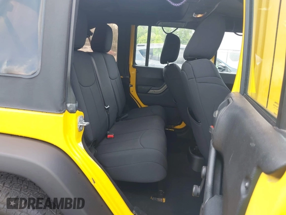 2015 Jeep Wrangler Unlimited Willys Wheeler with VIN 1C4BJWDG2FL643375, listed as a IAAI auction lot 42109724 with 112,357 mi miles and . Bid and sale history available at DreamBid. Image 8.