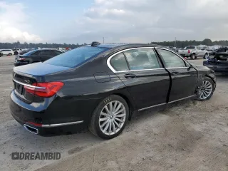2018 BMW 7 Series 740i with VIN WBA7E2C54JG742927, listed as a Copart auction lot 70306082 with 69,735 mi miles. Bid and sale history available at carsss.com. Image 3.