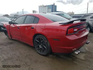 2013 Dodge Charger RT Max with VIN 2C3CDXCT3DH570659, listed as a Copart auction lot 73550864 with 111,394 mi miles and Salvage Title. Bid and sale history available at carsss.com. Image 2.