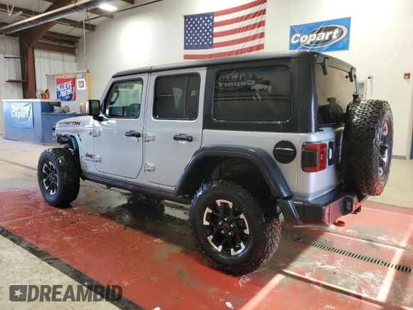 2024 Jeep Wrangler Rubicon with VIN 1C4PJXFG8RW355730, listed as a Copart auction lot 47982545 with 2,279 mi miles and Salvage title. Bid and sale history available at DreamBid. Image 2.