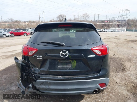 2015 Mazda CX-5 Touring with VIN JM3KE4CY2F0445178, listed as a IAAI auction lot 41828953 with 137,330 mi miles and . Bid and sale history available at DreamBid. Image 17.