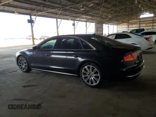 2011 Audi A8 with VIN WAURVAFD4BN004628, listed as a Copart auction lot 52244125 with 182,631 mi miles and Clean title. Bid and sale history available at DreamBid. Image 2.