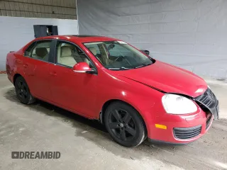 2009 Volkswagen Jetta SE z VIN 3VWRZ71K69M011873, wystawiony jako Copart lot #52881525 z przebiegiem 154 441 mil mil oraz Szkoda całkowita • Salvage title. Historia ofert i sprzedaży dostępna na DreamBid. Obrazek 4.