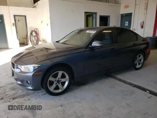2014 BMW 3 Series 328i xDrive with VIN WBA3B5C55EP540497, listed as a Copart auction lot 49250695 with 183,639 mi miles and Clean title. Bid and sale history available at DreamBid. Image 1.