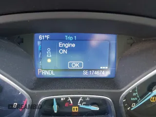 2014 Ford Focus SE with VIN 1FADP3F27EL202224, listed as a IAAI auction lot 42067644 with 174,674 mi miles. Bid and sale history available at carsss.com. Image 7.