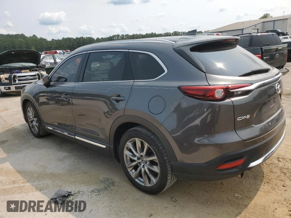2017 Mazda CX-9 Grand Touring z VIN JM3TCADYXH0138805, wystawiony jako Copart lot #59201915 z przebiegiem 147 896 mil mil oraz Czysty tytuł • Clean title. Historia ofert i sprzedaży dostępna na DreamBid. Obrazek 2.