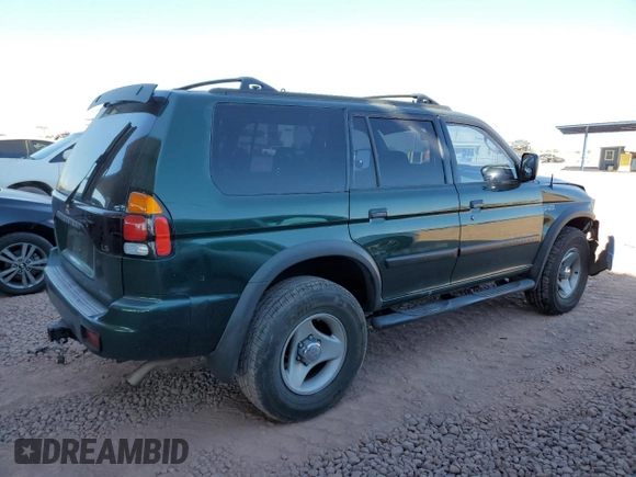 2000 Mitsubishi Montero LS z VIN JA4MT31H0YP015030, wystawiony jako Copart lot #83232584 z przebiegiem 75 294 mil mil oraz Szkoda całkowita • Salvage title. Historia ofert i sprzedaży dostępna na DreamBid. Obrazek 3.