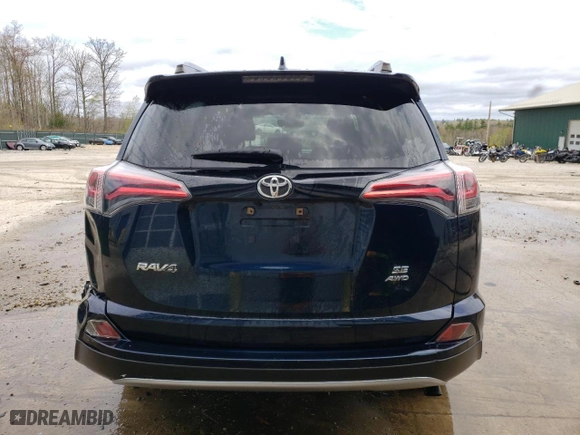 2018 Toyota RAV4 SE with VIN JTMJFREV0JD228148, listed as a Copart auction lot 53595874 with 91,557 mi miles and Salvage Title. Bid and sale history available at carsss.com. Image 6.