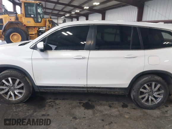 2021 Honda Pilot EX-L with VIN 5FNYF5H57MB022843, listed as a IAAI auction lot 41186957 with 57,836 mi miles. Bid and sale history available at carsss.com. Image 14.