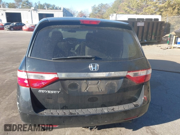 2011 Honda Odyssey EX-L with VIN 5FNRL5H61BB059275, listed as a IAAI auction lot 41293690 with 105,511 mi miles and . Bid and sale history available at carsss.com. Image 16.