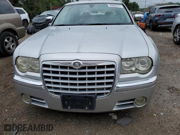 2006 Chrysler 300 C with VIN 2C3LA63H06H527558, listed as a Copart auction lot 64665314 with 74,237 mi miles and Salvage Title. Bid and sale history available at carsss.com. Image 5.