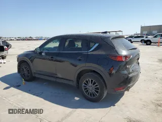 2021 Mazda CX-5 Touring z VIN JM3KFBCM8M0321766, wystawiony jako Copart lot #52845085 z przebiegiem 115 627 mil mil oraz Szkody całkowita. Historia ofert i sprzedaży dostępna na DreamBid. Obrazek 2.