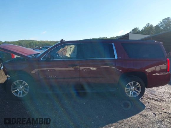 2017 Chevrolet Suburban LT with VIN 1GNSKHKC3HR311901, listed as a IAAI auction lot 40883429 with 141,325 mi miles. Bid and sale history available at carsss.com. Image 14.