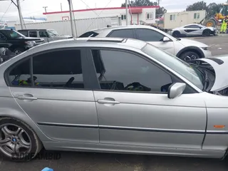 2000 BMW 3 Series 323i with VIN WBAAM3341YCA87796, listed as a IAAI auction lot 41765744 with 169,051 mi miles. Bid and sale history available at carsss.com. Image 13.