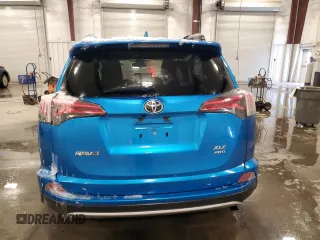 2018 Toyota RAV4 XLE with VIN JTMRFREV3JJ748218, listed as a Copart auction lot 44839665 with 74,791 mi miles and Salvage Title. Bid and sale history available at DreamBid. Image 6.