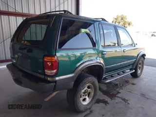 1999 Ford Explorer XLT z VIN 1FMZU34E5XZB99275, wystawiony jako IAAI lot #42293675 z przebiegiem 249 541 mil mil oraz . Historia ofert i sprzedaży dostępna na DreamBid. Obrazek 4.