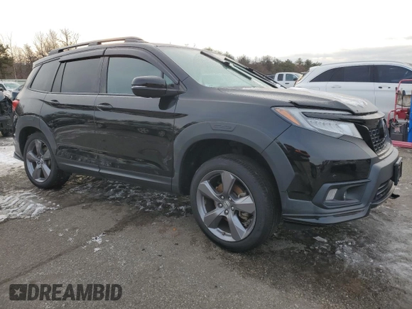 2021 Honda Passport Touring with VIN 5FNYF8H96MB007268, listed as a Copart auction lot 89077285 with 63,232 mi miles and Salvage Title. Bid and sale history available at carsss.com. Image 4.