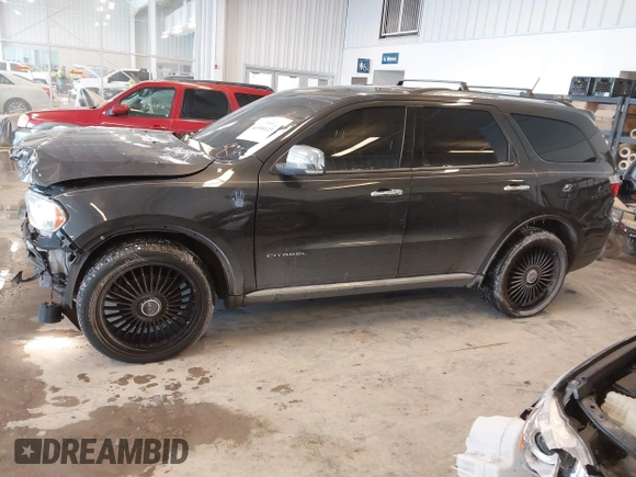 2011 Dodge Durango Citadel with VIN 1D4SE5GT6BC632724, listed as a IAAI auction lot 41590123 with 118,509 mi miles and . Bid and sale history available at DreamBid. Image 14.