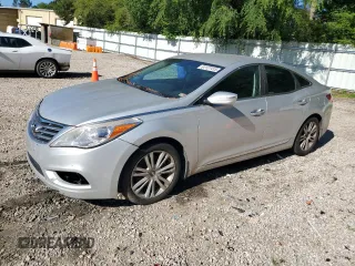 2014 Hyundai Azera Limited z VIN KMHFH4JG1EA424029, wystawiony jako Copart lot #61127415 z przebiegiem 209 844 mil mil oraz Czysty tytuł • Clean title. Historia ofert i sprzedaży dostępna na DreamBid. Obrazek 1.