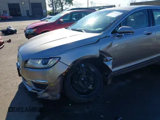 2018 Lincoln MKZ Reserve with VIN 3LN6L5F9XJR604852, listed as a IAAI auction lot 41260227 with 64,349 mi miles and . Bid and sale history available at DreamBid. Image 6.