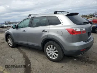 2010 Mazda CX-9 Grand Touring z VIN JM3TB3MV5A0210214, wystawiony jako Copart lot #51251585 z przebiegiem 138 885 mil mil oraz Szkoda całkowita • Salvage title. Historia ofert i sprzedaży dostępna na DreamBid. Obrazek 2.