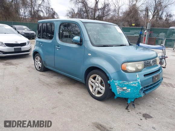 2010 Nissan Cube S z VIN JN8AZ2KRXAT170470, wystawiony jako IAAI lot #41751544 z przebiegiem 108 437 mil mil oraz . Historia ofert i sprzedaży dostępna na DreamBid. Obrazek 1.