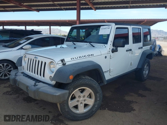2015 Jeep Wrangler Unlimited Rubicon with VIN 1C4BJWFG9FL744927, listed as a IAAI auction lot 42169740 with 106,352 mi miles and . Bid and sale history available at DreamBid. Image 2.